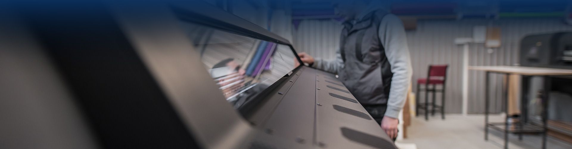 printer specialist using digital printing equipment